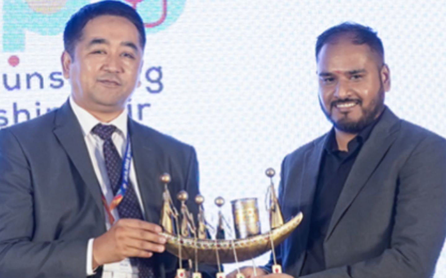 Dean of Jalal-Abad International University with KAC CEO